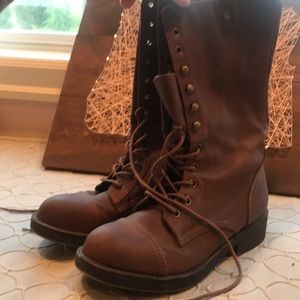 Brown combat boots.